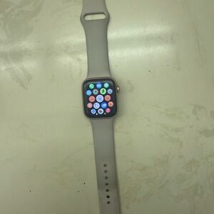 Pink Apple Watch SE Second Gen with charger